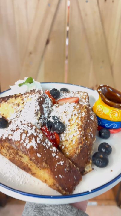 Tostones Cafe - Getting my delicious French toast delivered to me! It's so good! You gotta try it! - Latin American Near Me - Old Orchard Beach, Maine