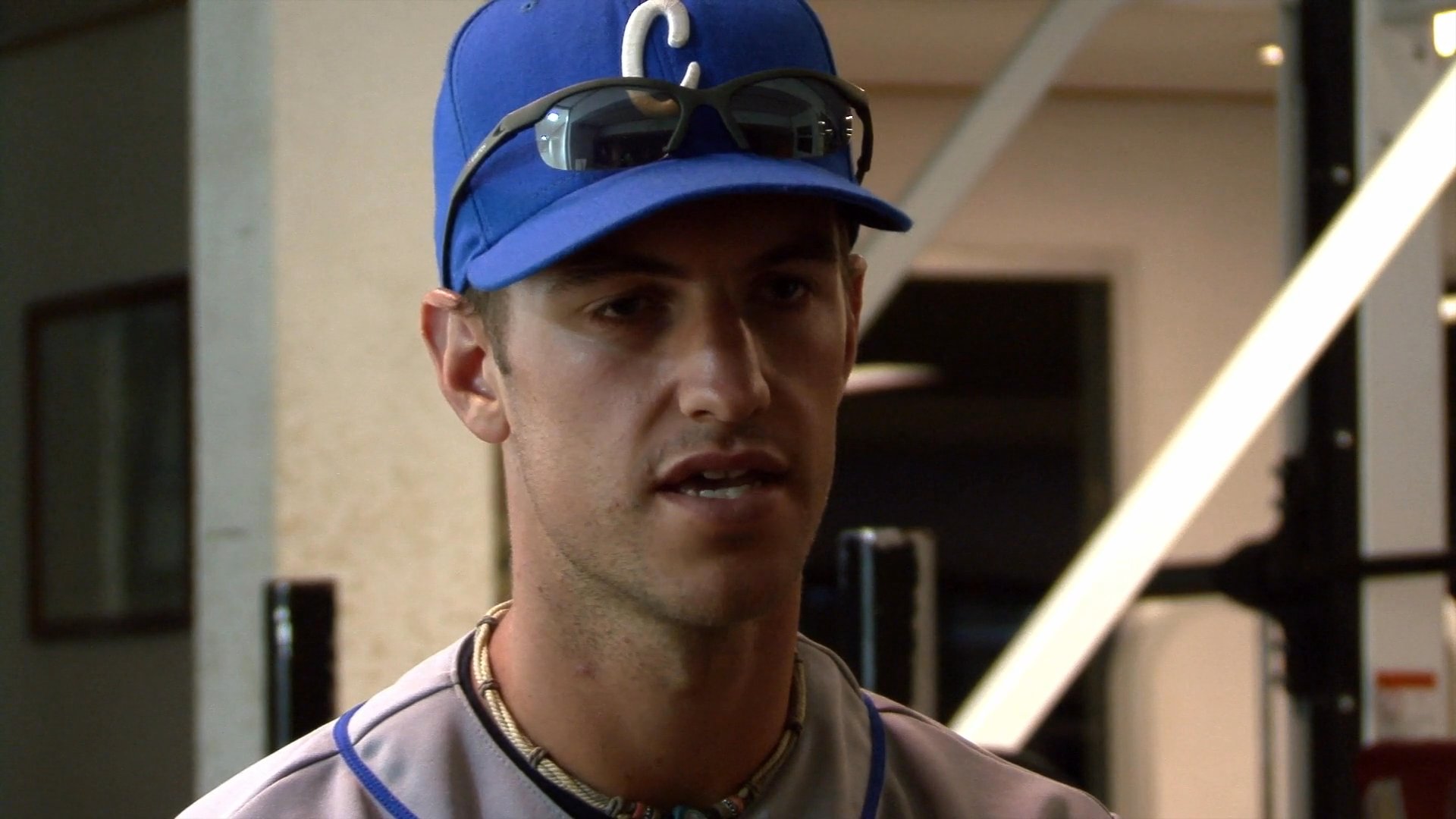 A baseball player and a coach discuss team performance and accountability during an interview. The speakers share perspectives on the challenges faced by the team and the importance of collective responsibility.