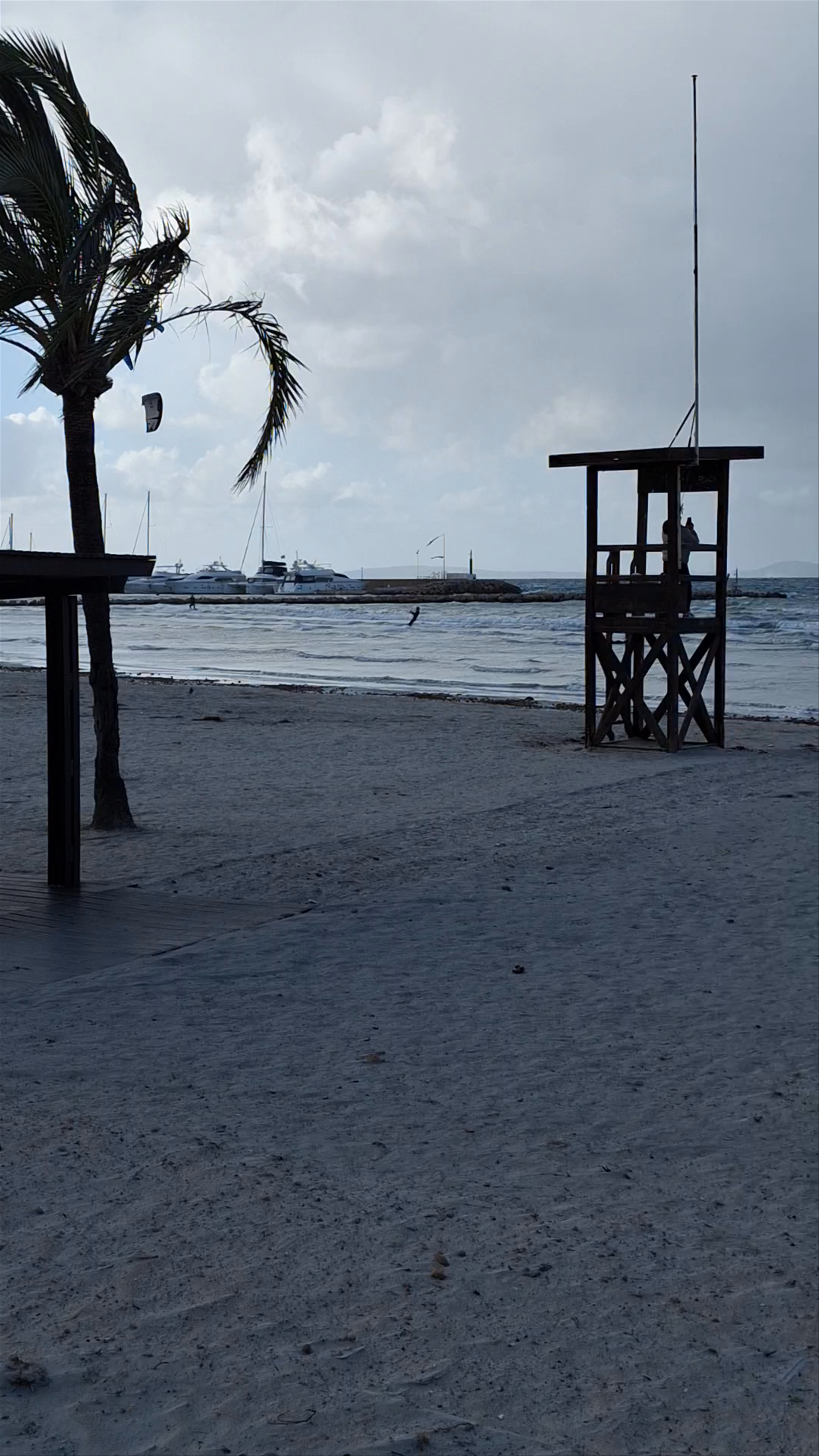 S'Arenal Beach: Windswept Coastal Escape in Mallorca, Spain