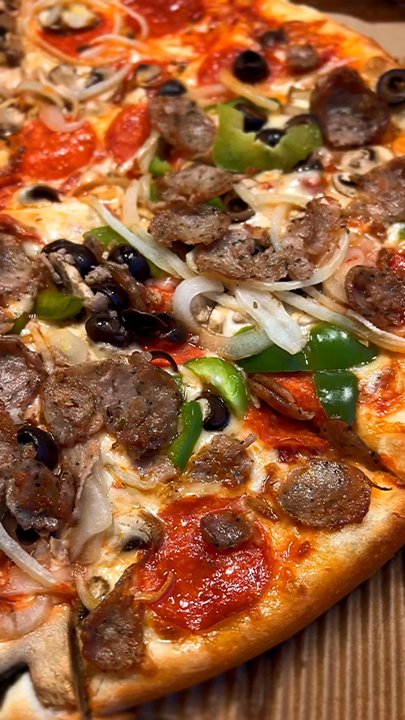Pagliacci Pizza - Half Brooklyn bridge - half pep, mush, onion - Pizza Near Me - Seattle, Washington