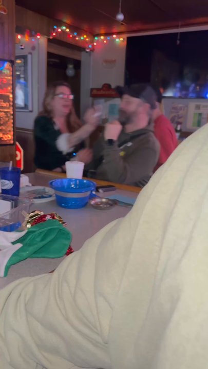 Stumpy’s North End Bar - Fellow bartender friend from the filling station rubbing cake all over Stumpy's face on his birthday - Dive Bars Near Me - Lafayette, Indiana