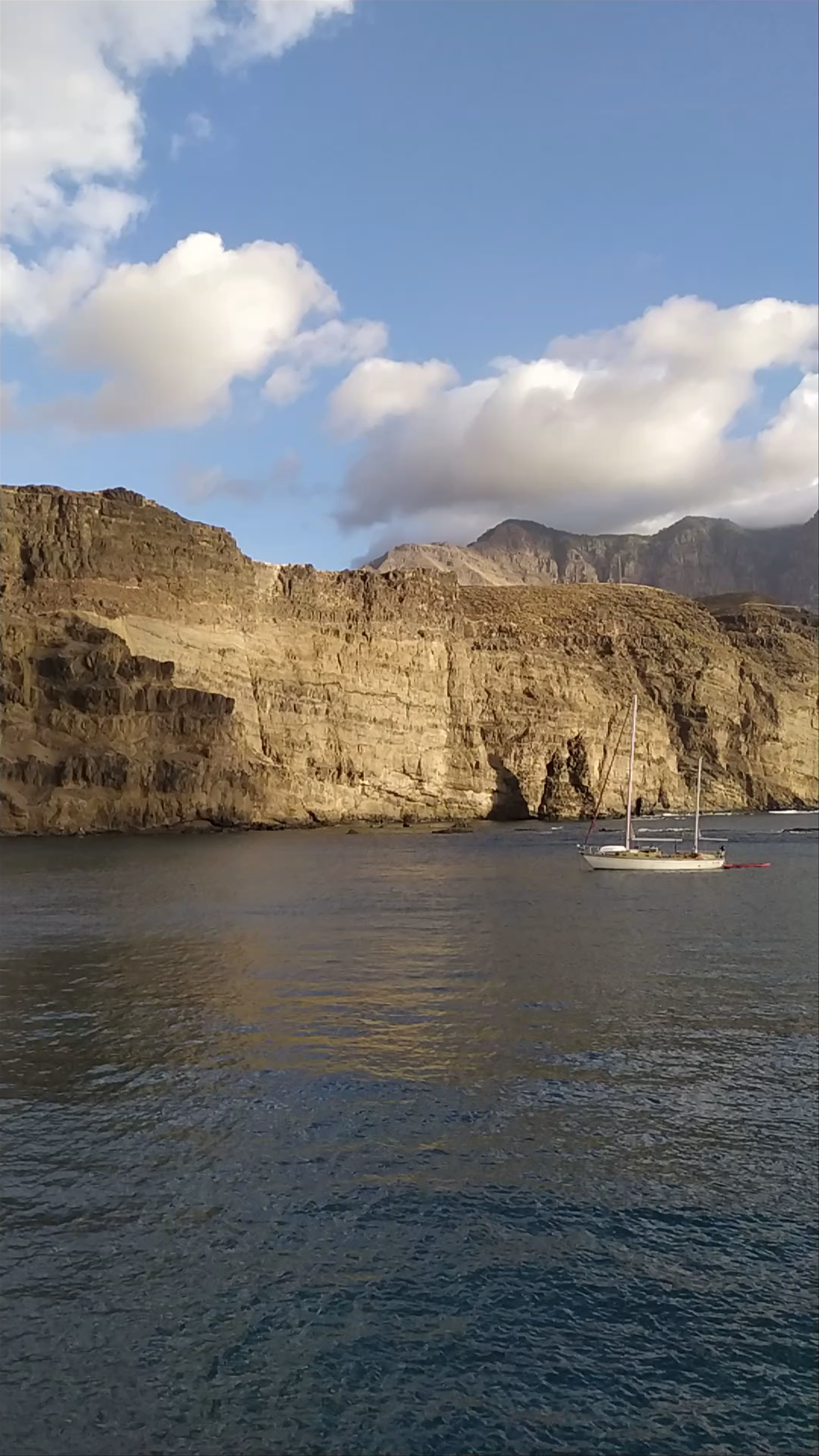 Golden Cliffs and Tranquil Waters at Agaete - Puerto de Las Nieves, Spain