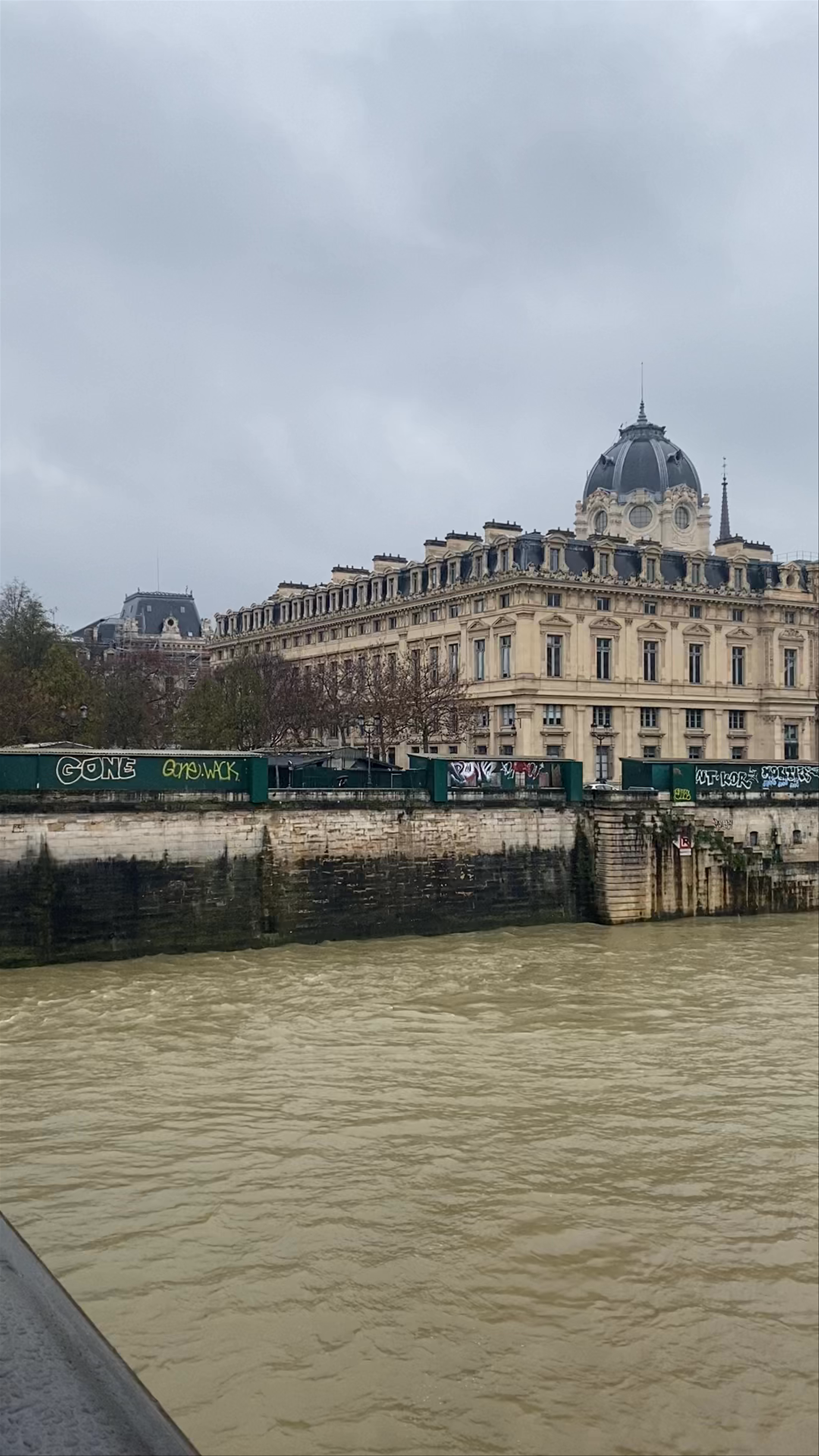 Pont Notre-Dame Views: Moody River Seine and Parisian Classic Architecture