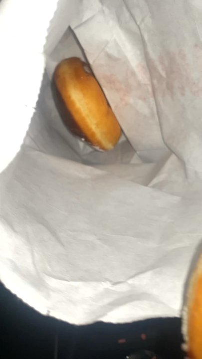 Dunkin' - I separated the powdered and the chocolate myself, why four in one small bag? - Donuts Near Me - Lake Forest, California