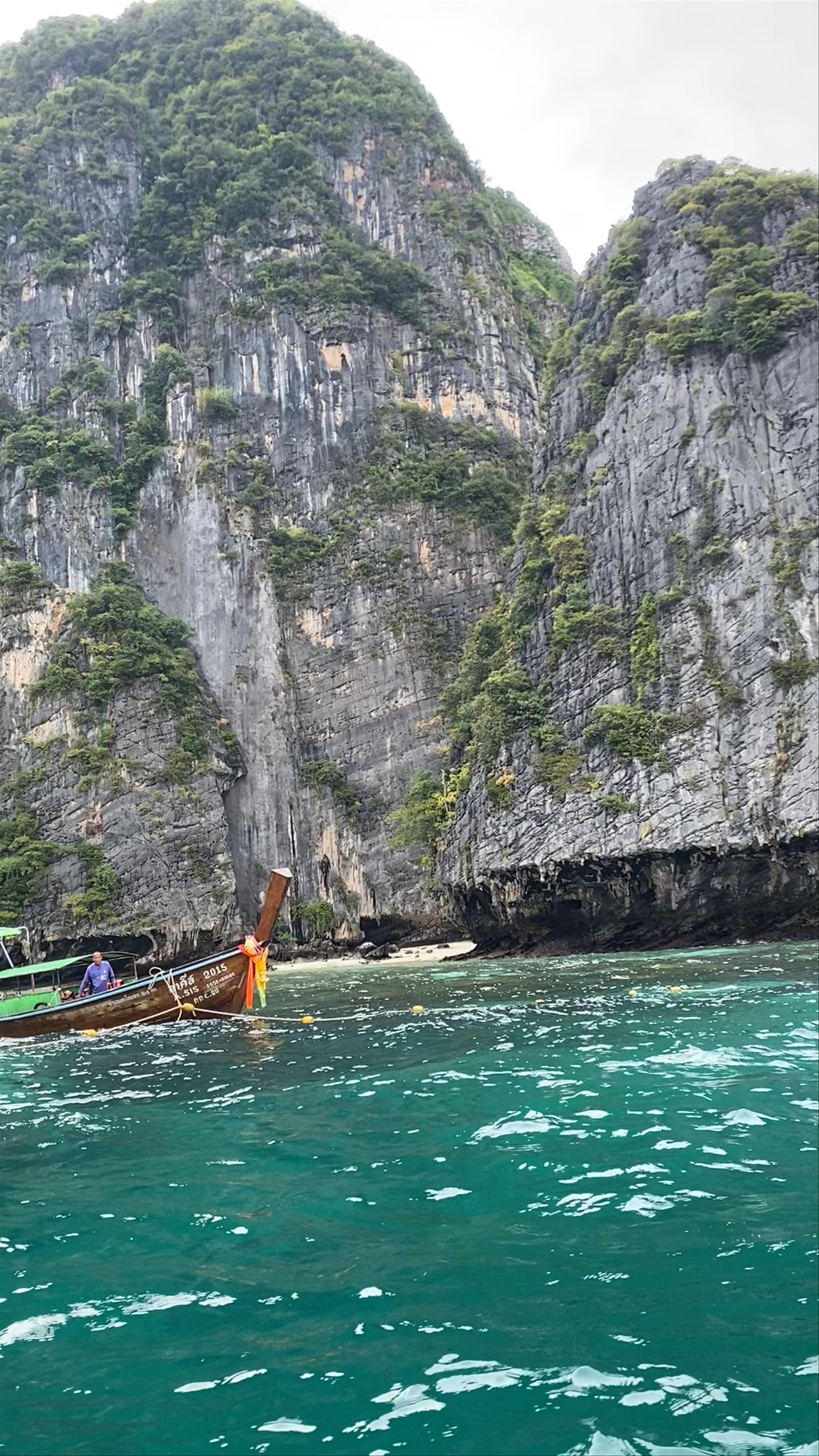 Malong Bay: Tranquil Seascape and Towering Limestone Cliffs in Krabi