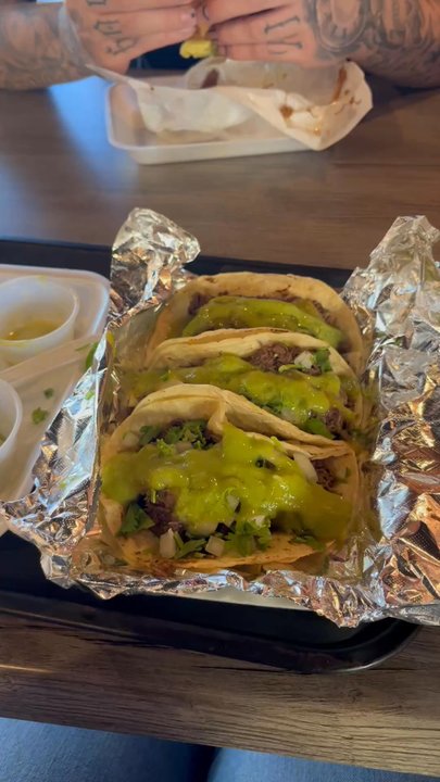 Carnitas Michoacanas - This is how I prepped my tacos, with guacamole and green salsa, cilantro and onion, and some limes of course! - Mexican Near Me - Avondale, Arizona