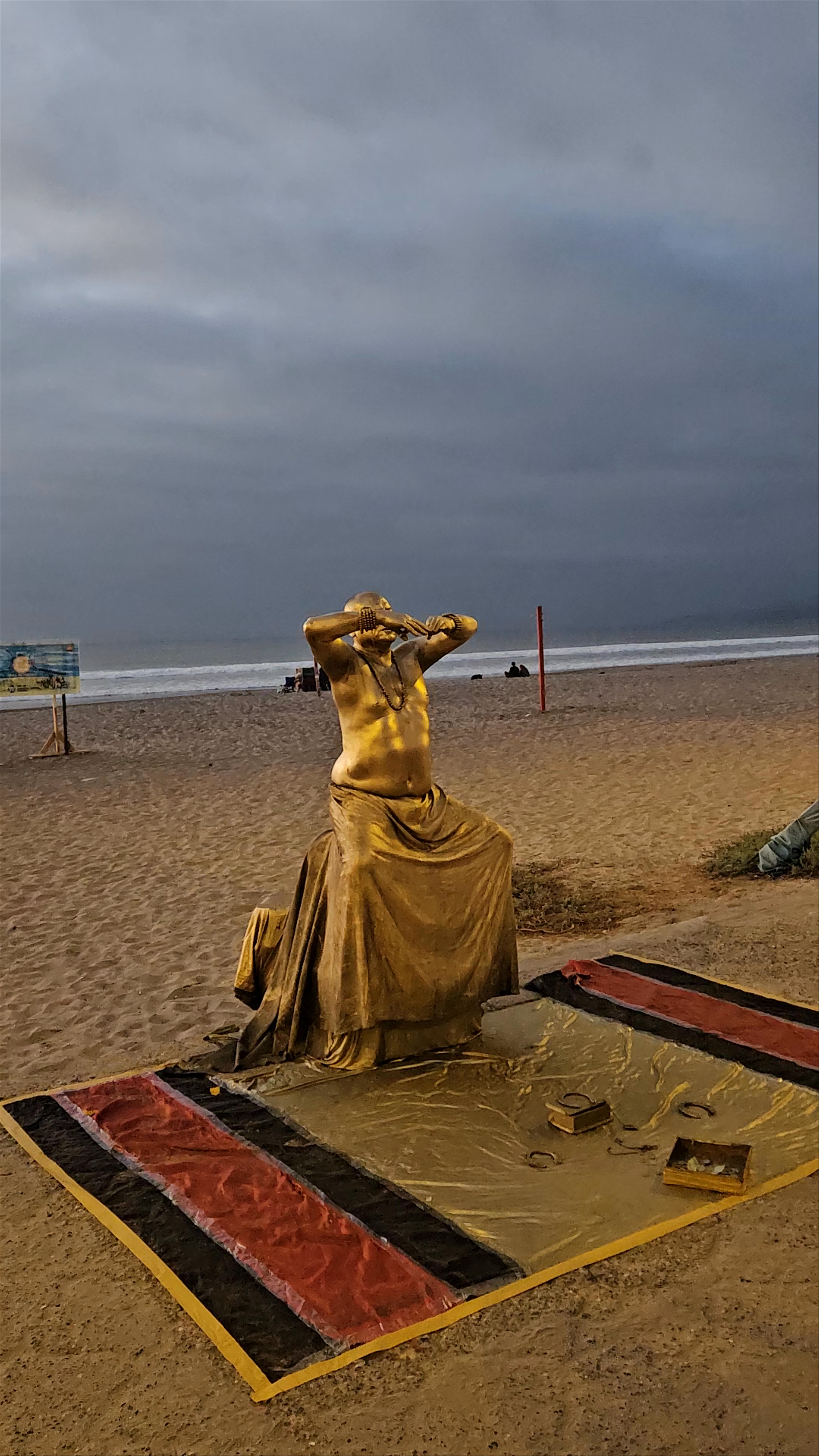 Golden Living Statue on La Serena Beach at Faro Monumental