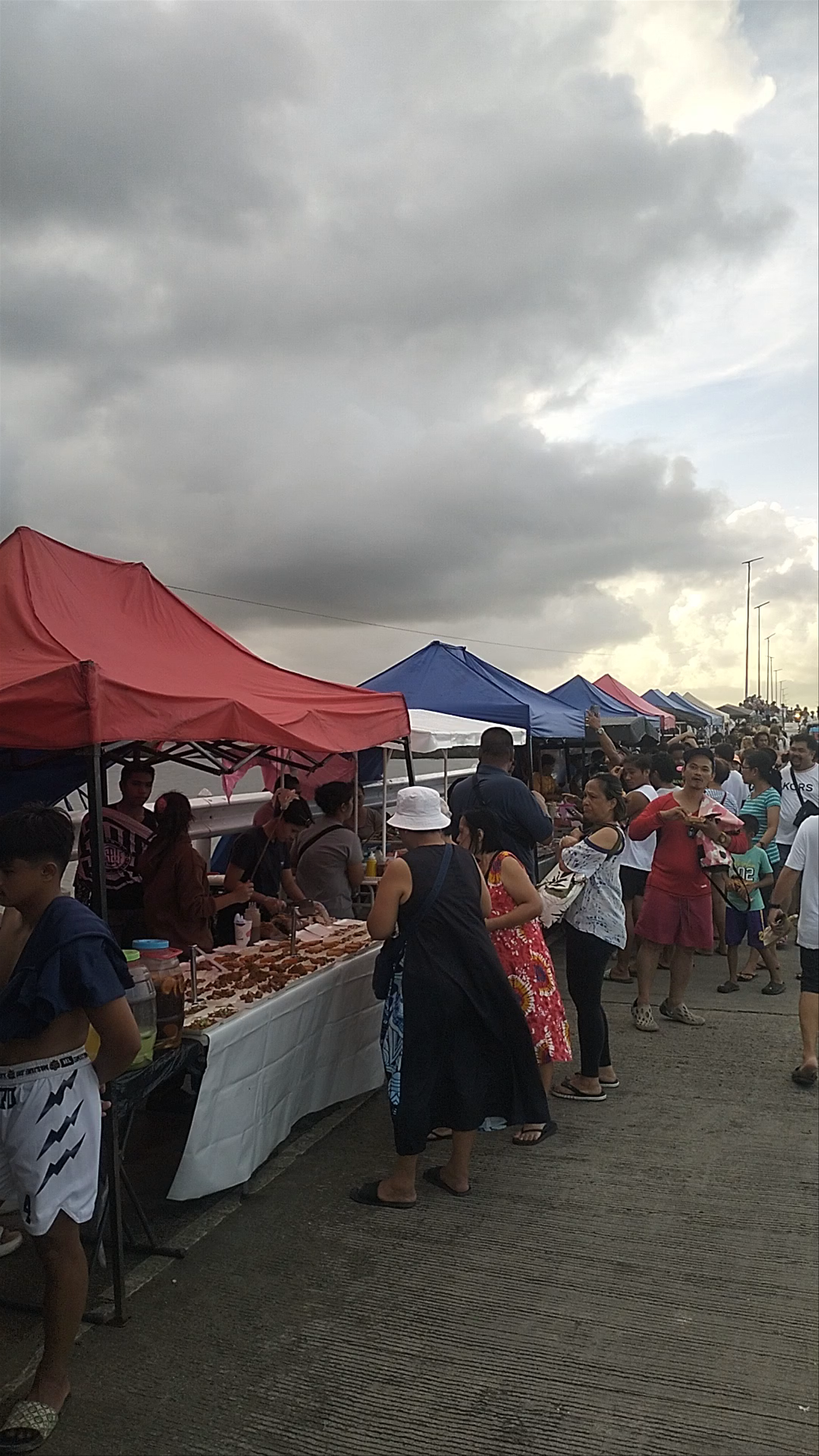 Sunset Bridge Market Buzz in General Luna, Surigao del Norte