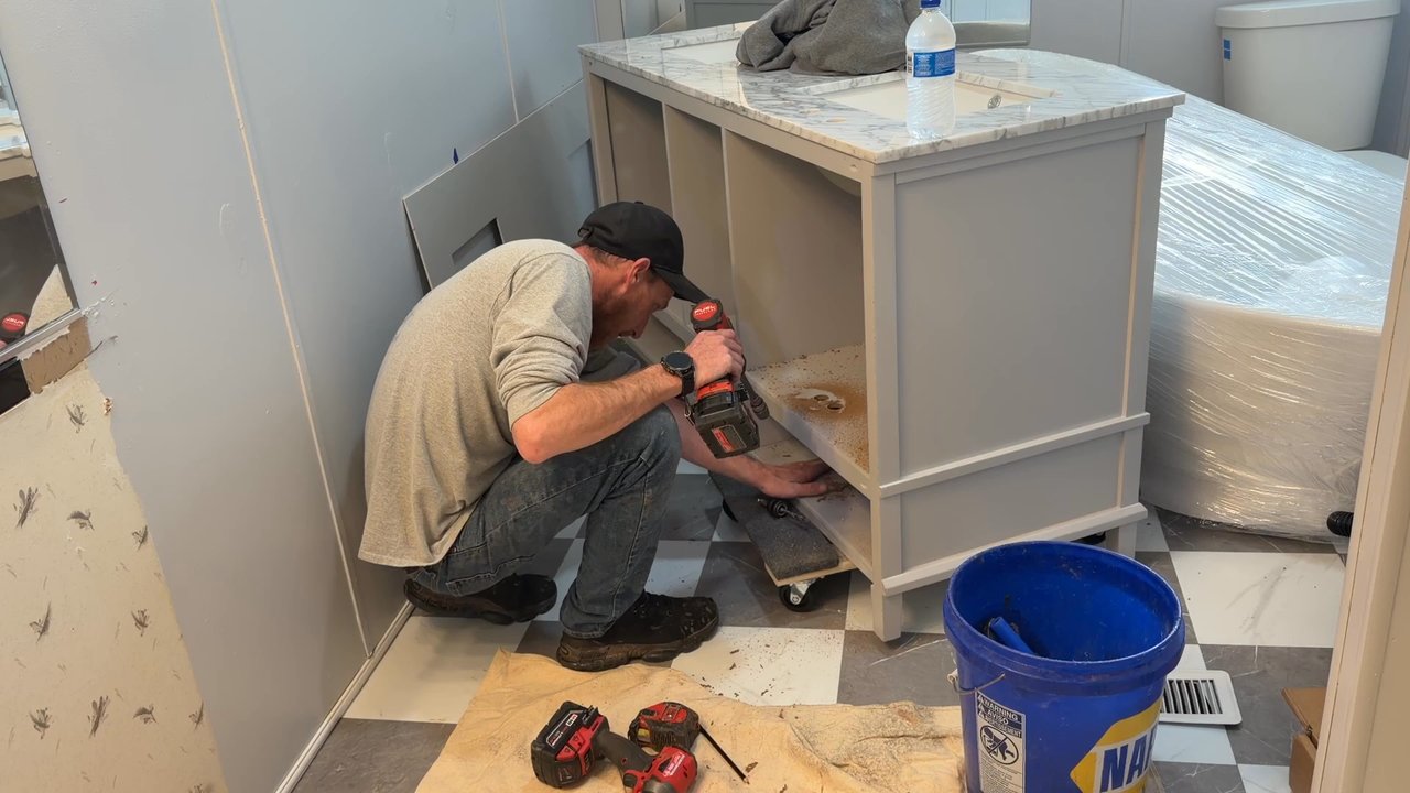 King’s Plumbing - Bryan customizing my vanity for pipe fittings. - Plumbing Near Me