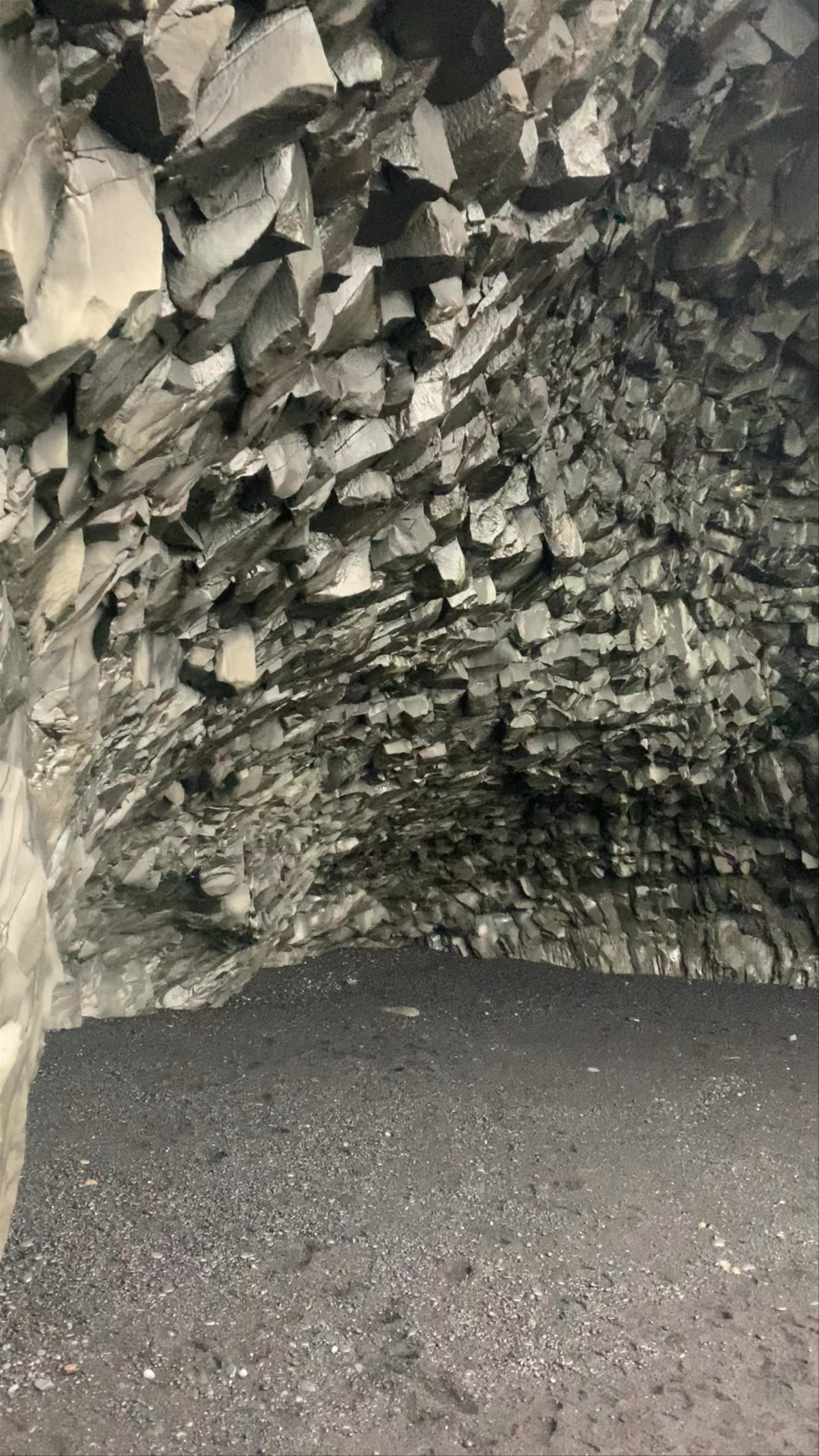 Exploring the Basalt Cave at Reynisfjara Black Sand Beach, Iceland