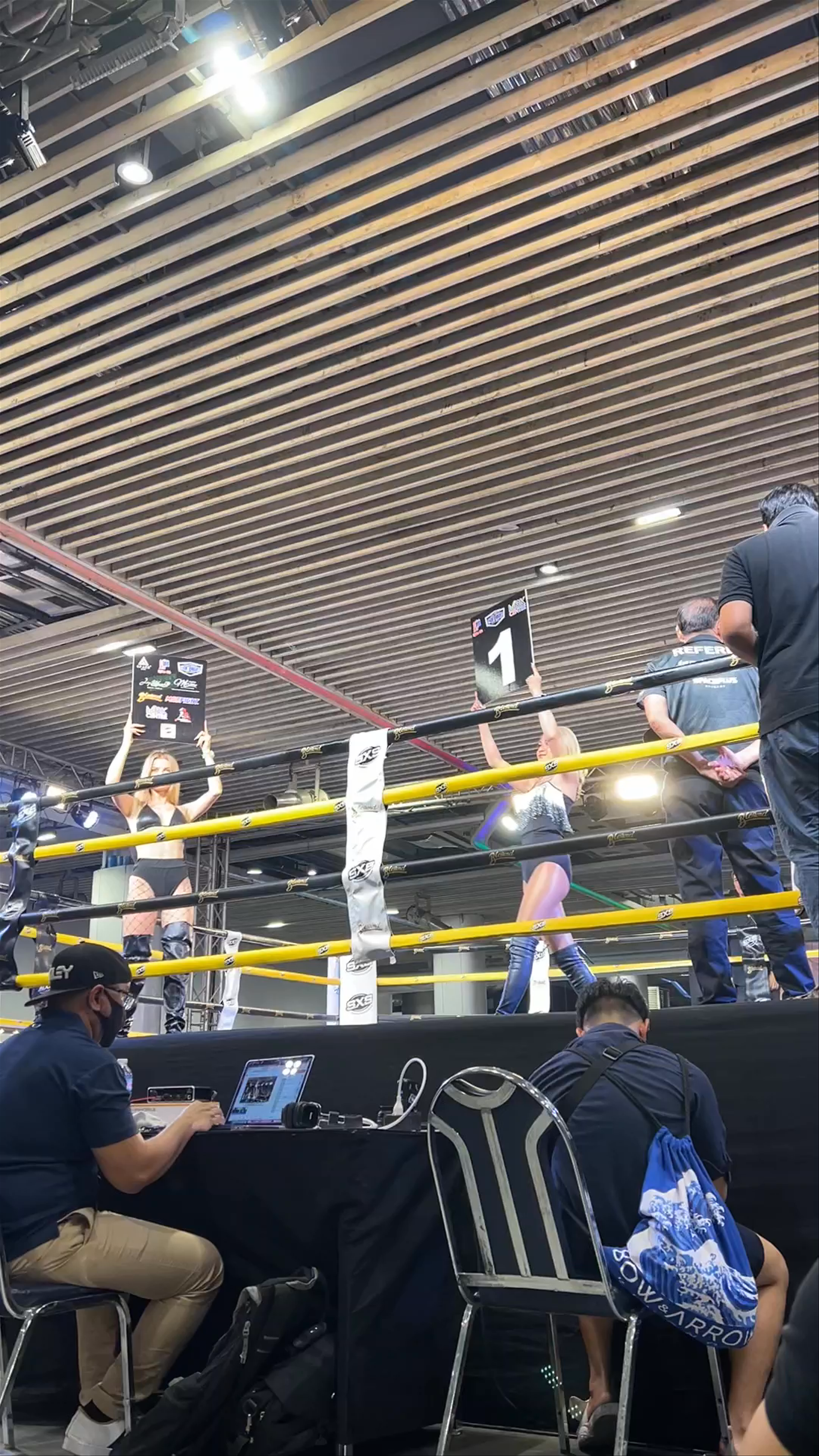 Live Muay Thai Fight & Ring Card Girls at MBK Center, Bangkok
