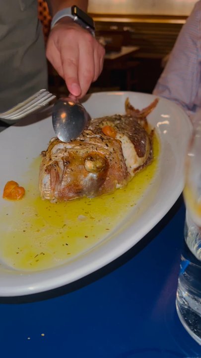 Andros Taverna - Deboning fish by server. - Greek Near Me - Chicago, Illinois