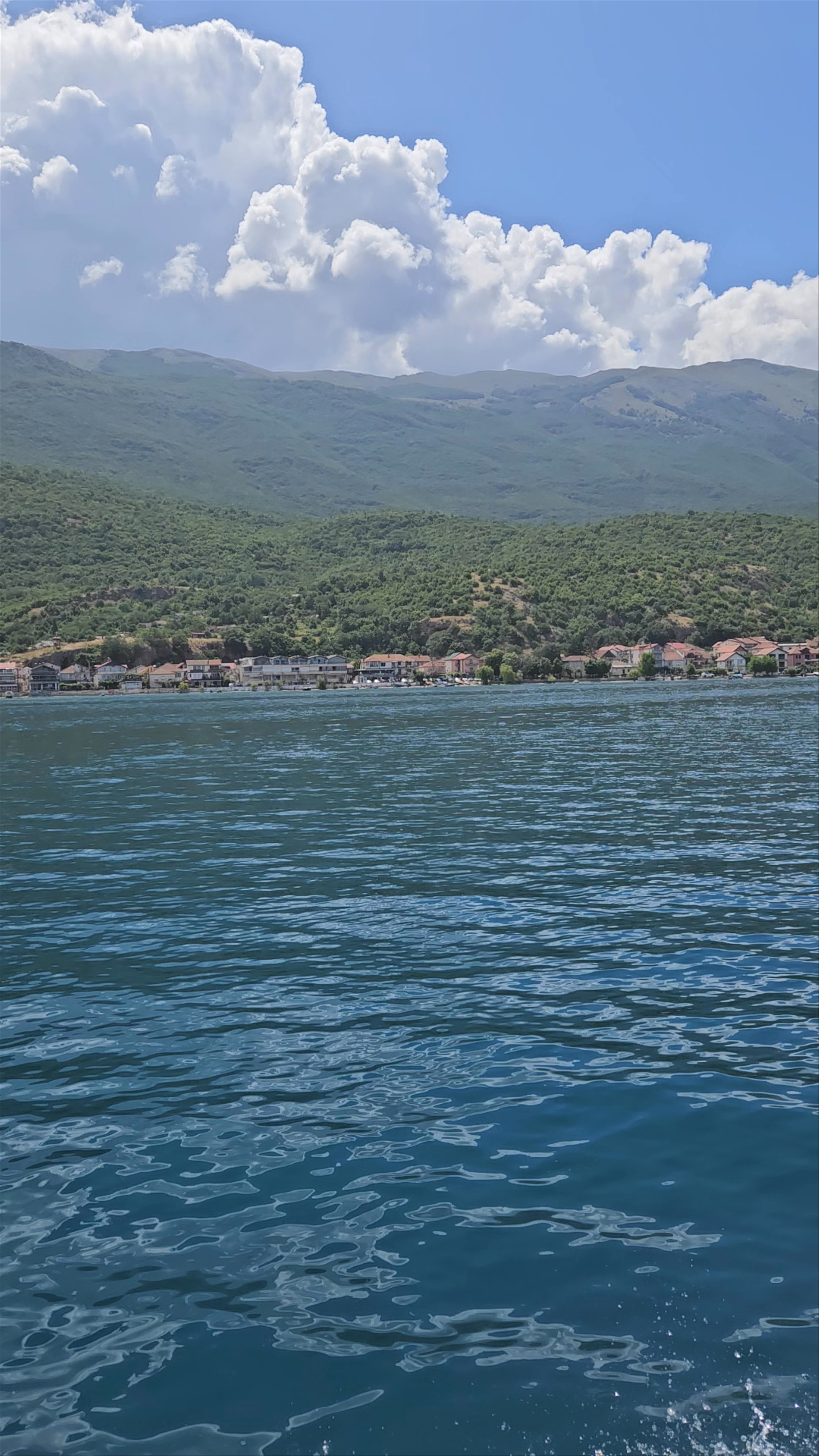 Lake Ohrid: Serene Boat Ride Amid Majestic Mountain Views