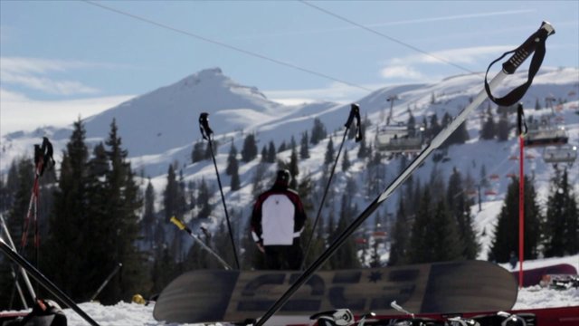 Man taking a break from skiing
