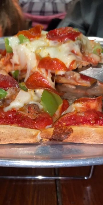 Paisans Pizzeria - Cheese pull! - Pizza Near Me - Lisle, Illinois