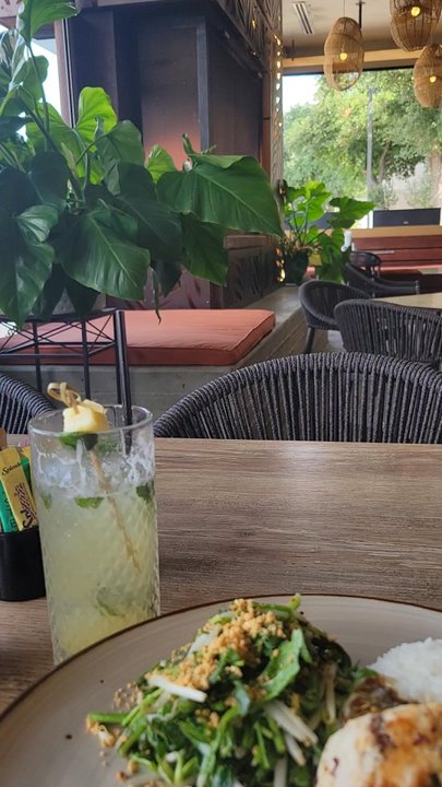 Malai Kitchen - A refreshing cocktail and the red chili pineapple redfish - Thai Near Me - Dallas, Texas