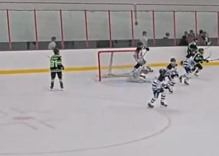 Derek Carpenter-Wasserman with the MICHIGAN goal in the Superseries Ice Breaker