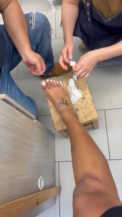 Nail Studio - My leg is covering the bloody bandaid - Nail Salons Near Me - Passaic, New Jersey