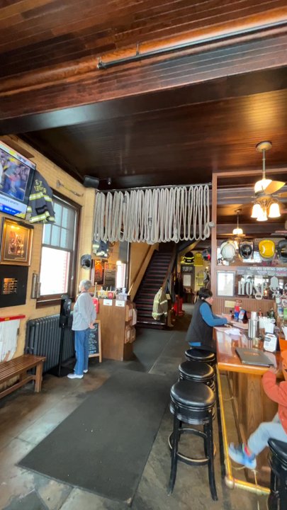 Hose 22 - The hoses hanging above the bar - Wine Bars Near Me - Rochester, New York