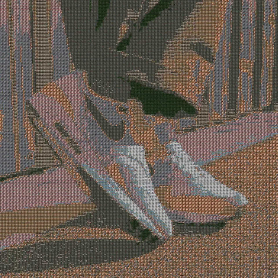  A mosaic of user-generated content builds from low resolution to high resolution, forming a grid that transforms into a dynamic video. The video reveals a craftsman skillfully creating Nike footwear, showcasing artistry and innovation.