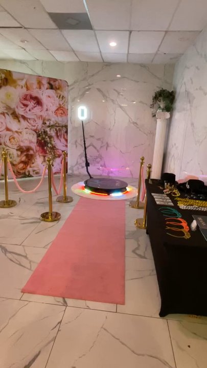 Captured Memories Photobooths - Pink carpet and velvet ropes to match the sweet 16 floral theme. - Photo Booth Rentals Near Me