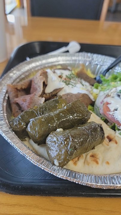 STOP-N-GO GYROS - Gyro plate with grape leaves. So good and well seasoned. - Mediterranean Near Me - Lewisville, Texas