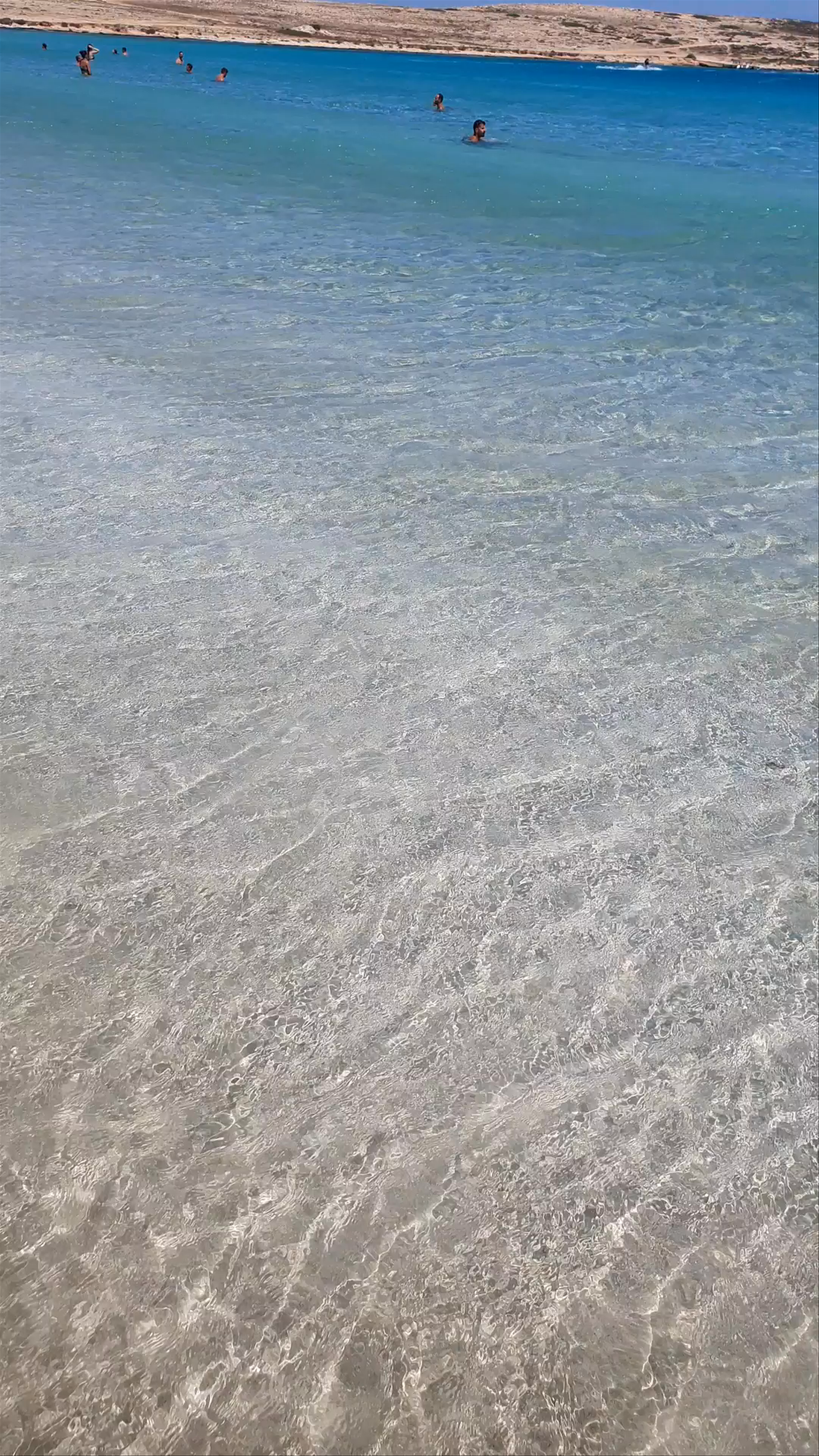 Platis Gialos Beach: Crystal Clear Waters and Mediterranean Bliss in Milos, Greece