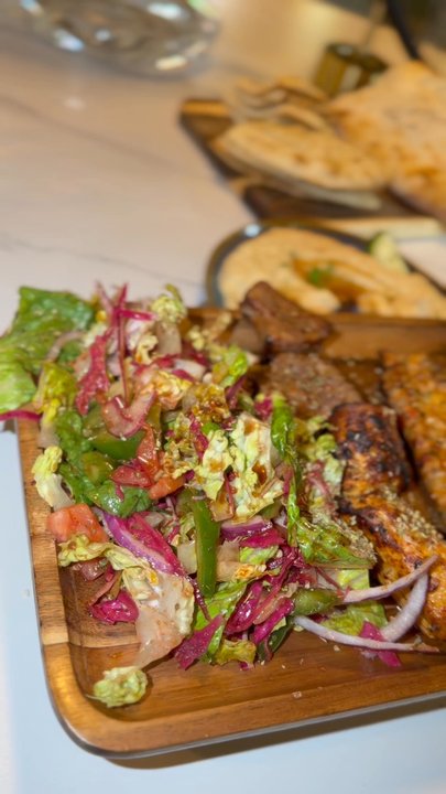 Baran Hookah Lounge - Meat platter for one, hummus, puffy bread, pita, and Branzino - Hookah Bars Near Me - Jacksonville, Florida