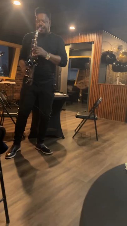 Southerlands Cigar Lounge - Saxophonist playing at the brunch and mimosa event at Southerlands. - Cigar Bars Near Me - High Point, North Carolina