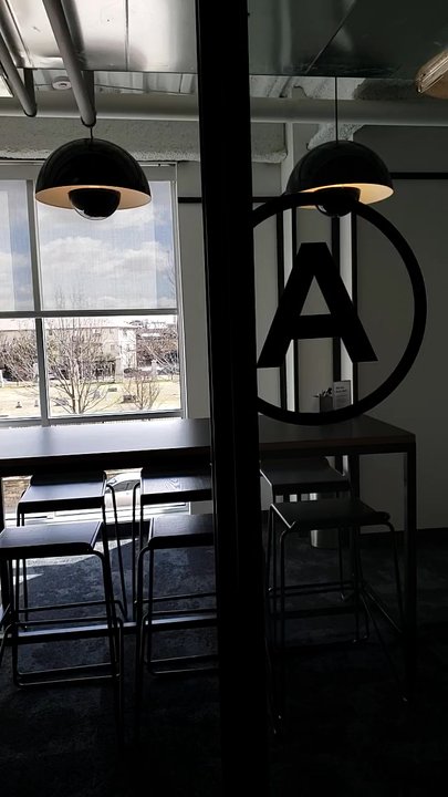 WeWork - Plano - WeWork Telephone Booth desks are great! - Shared Office Spaces Near Me - Plano, Texas
