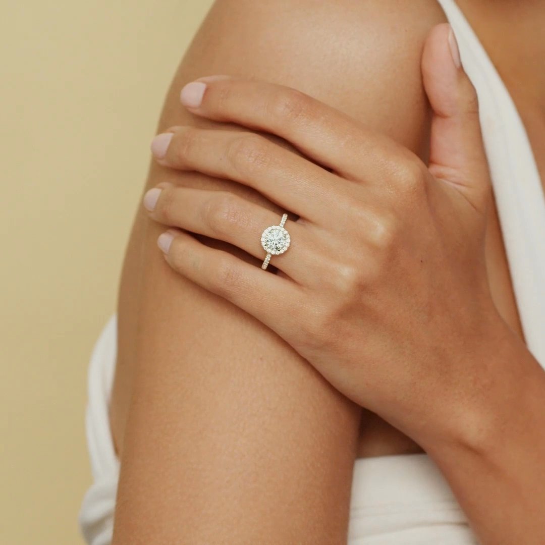 The Halo | Round Brilliant | 18k | Yellow Gold | bandAccent: Pavé | caratWeight: 1.5ct | haloSize: original | diamondOrientation: vertical