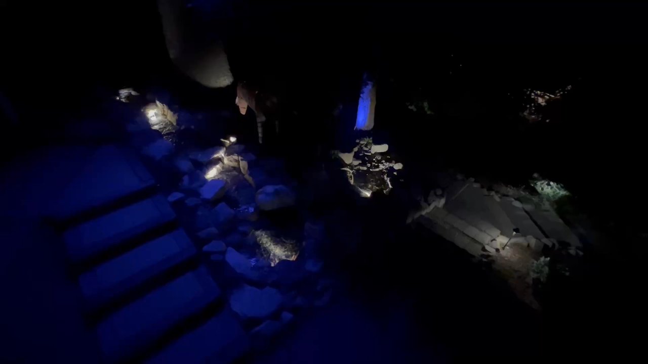 Skyline Ponds - Our waterfall at night - Landscaping Near Me