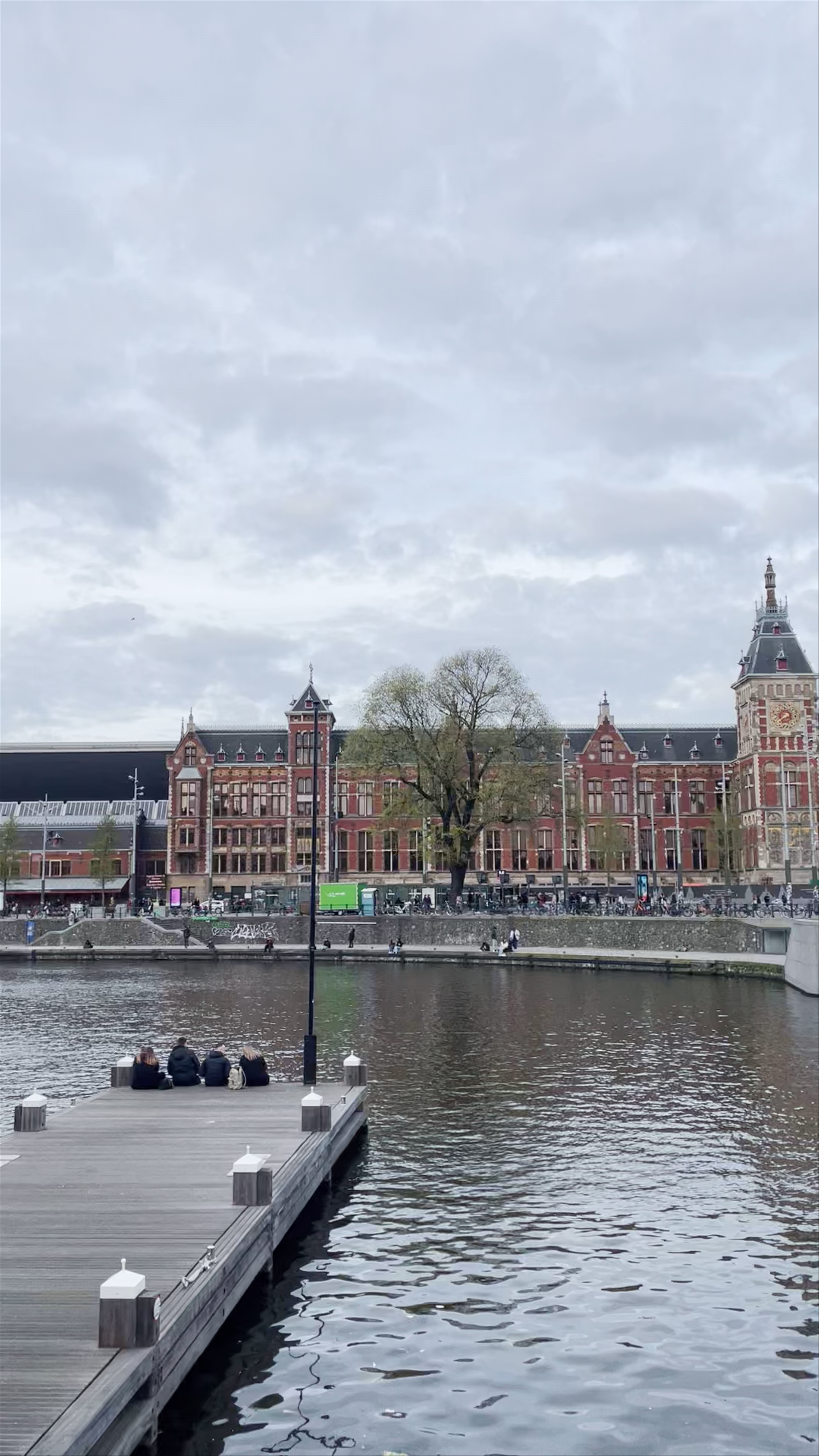 Amsterdam Central Station and Canal Serenity