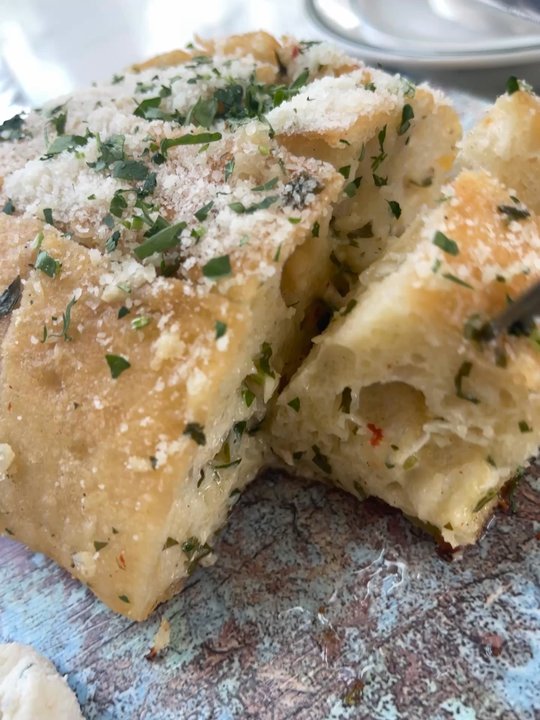 Bocca Italian Kitchen - This garlic bread is so good y'all. I don't know how they get the herbs and the garlic in there but 10/10!! - Italian Near Me - Houston, Texas