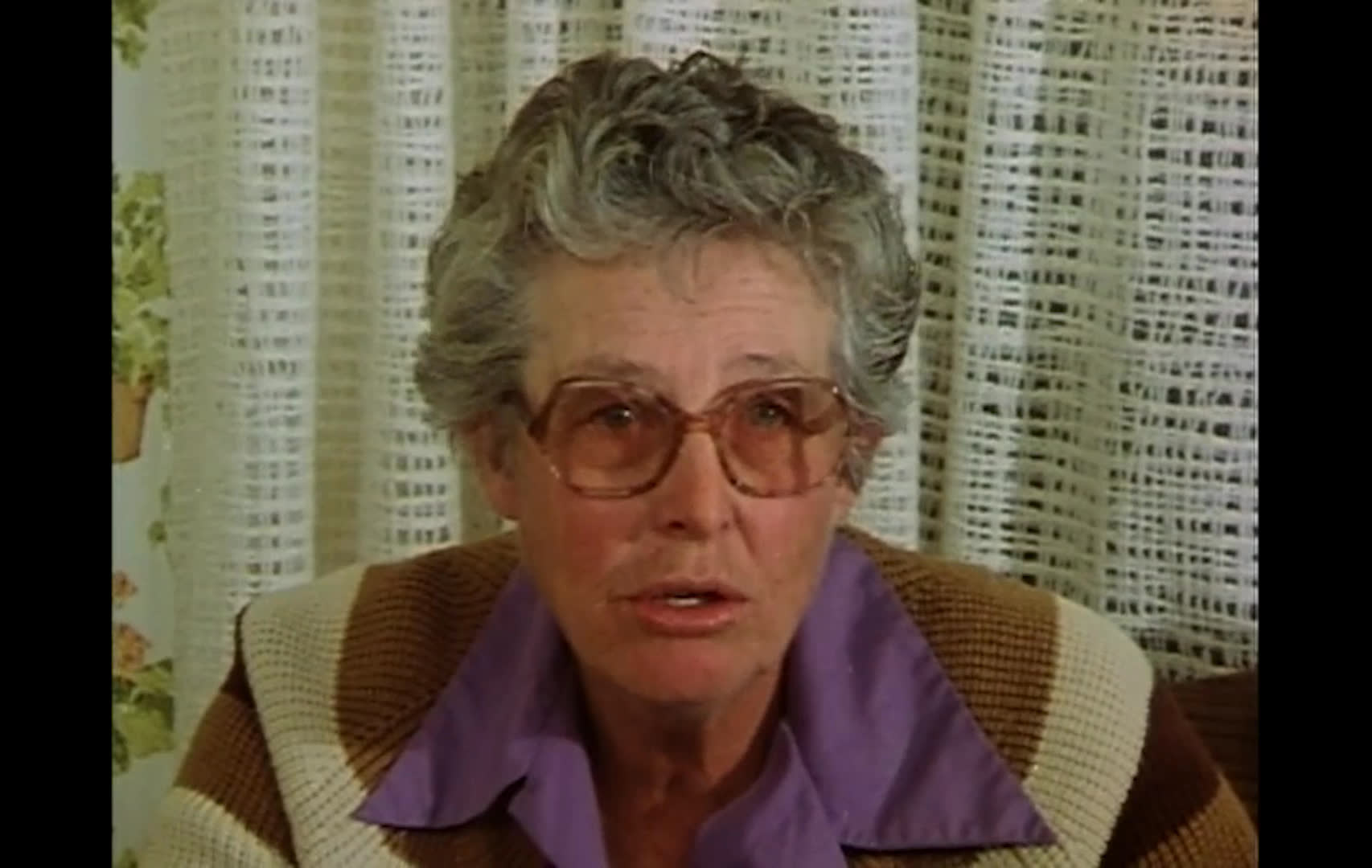 A rancher moves cattle through a barn as a woman discusses the demanding work of spring calving and checking heifers. Snowy scenes of a tractor and horseback cattle handling underscore the challenges of ranch life.