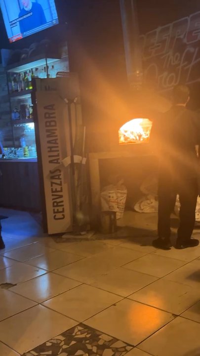Tre Amici - This is the brick oven they cook the pizza in - Cocktail Bars Near Me - Bayamón, Puerto Rico
