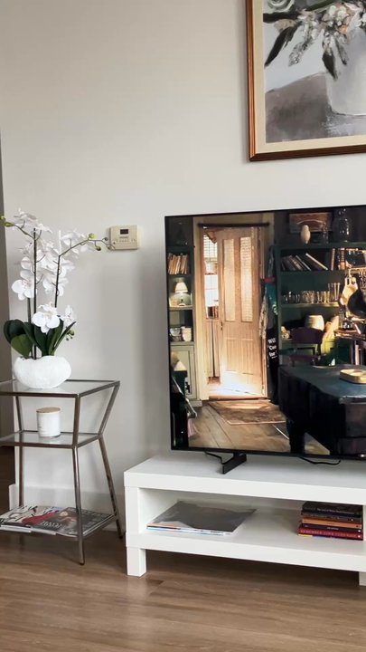Homegoods - Accomplishing the impossible, hanging a beautiful wall decor by centering it & placing it above the TV & stand; was done to perfection. - Department Stores Near Me - Alpharetta, Georgia