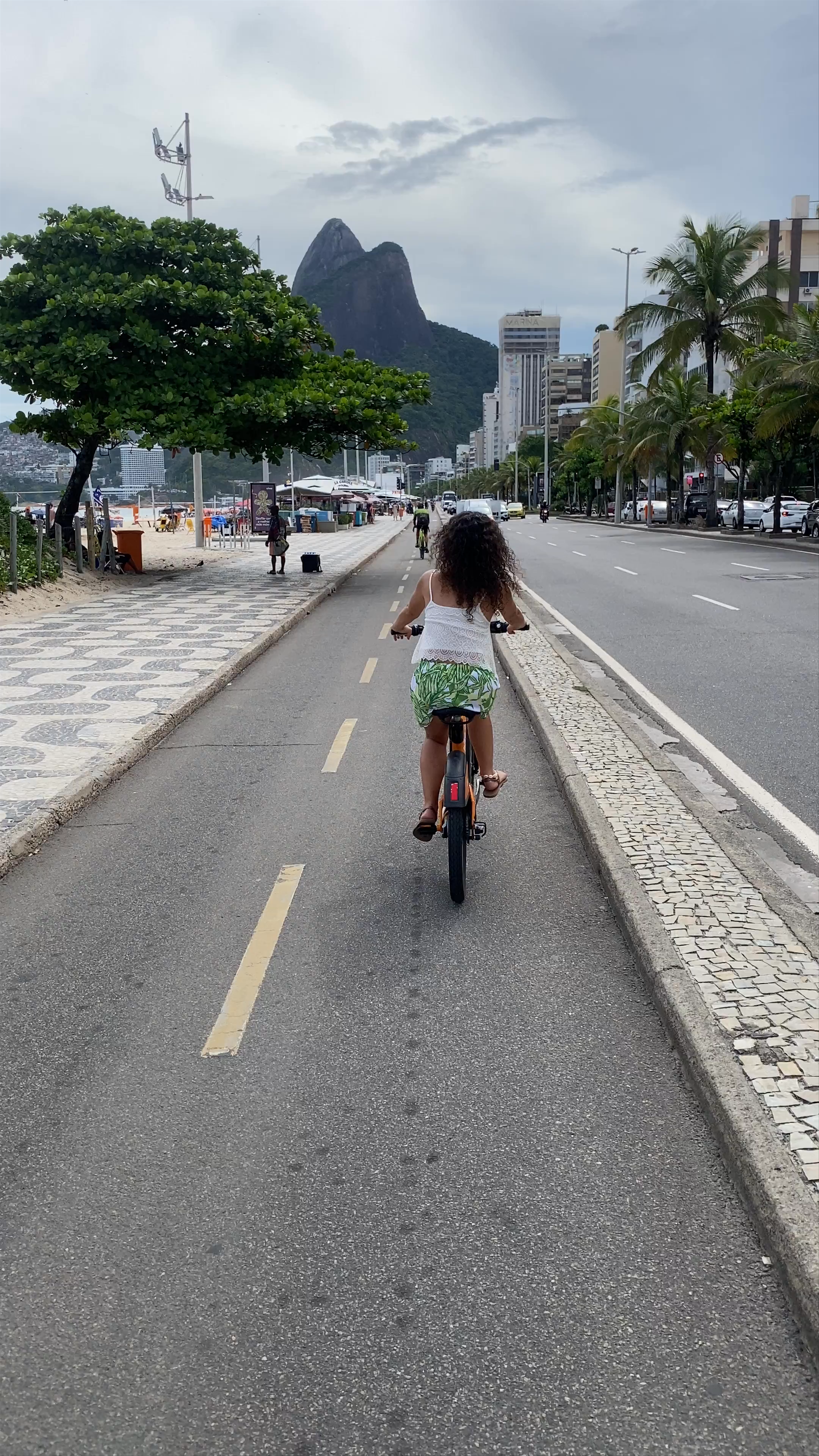 Cycling Along Ipanema Beach with Iconic Dois Irmãos Views, Rio de Janeiro