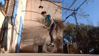 riu submission: 180 with hand on the tire