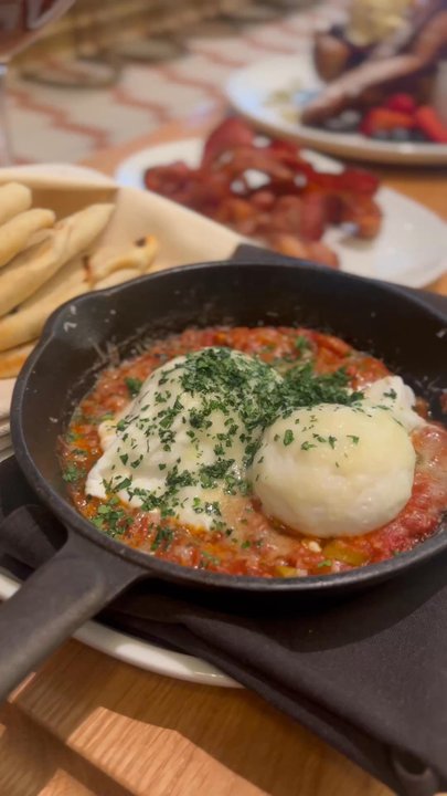 Abrielle - Baked eggs, pita; scrambled eggs; French toast; bacon; espresso martini; Sooooo good! - Seafood Near Me - Toronto, Ontario