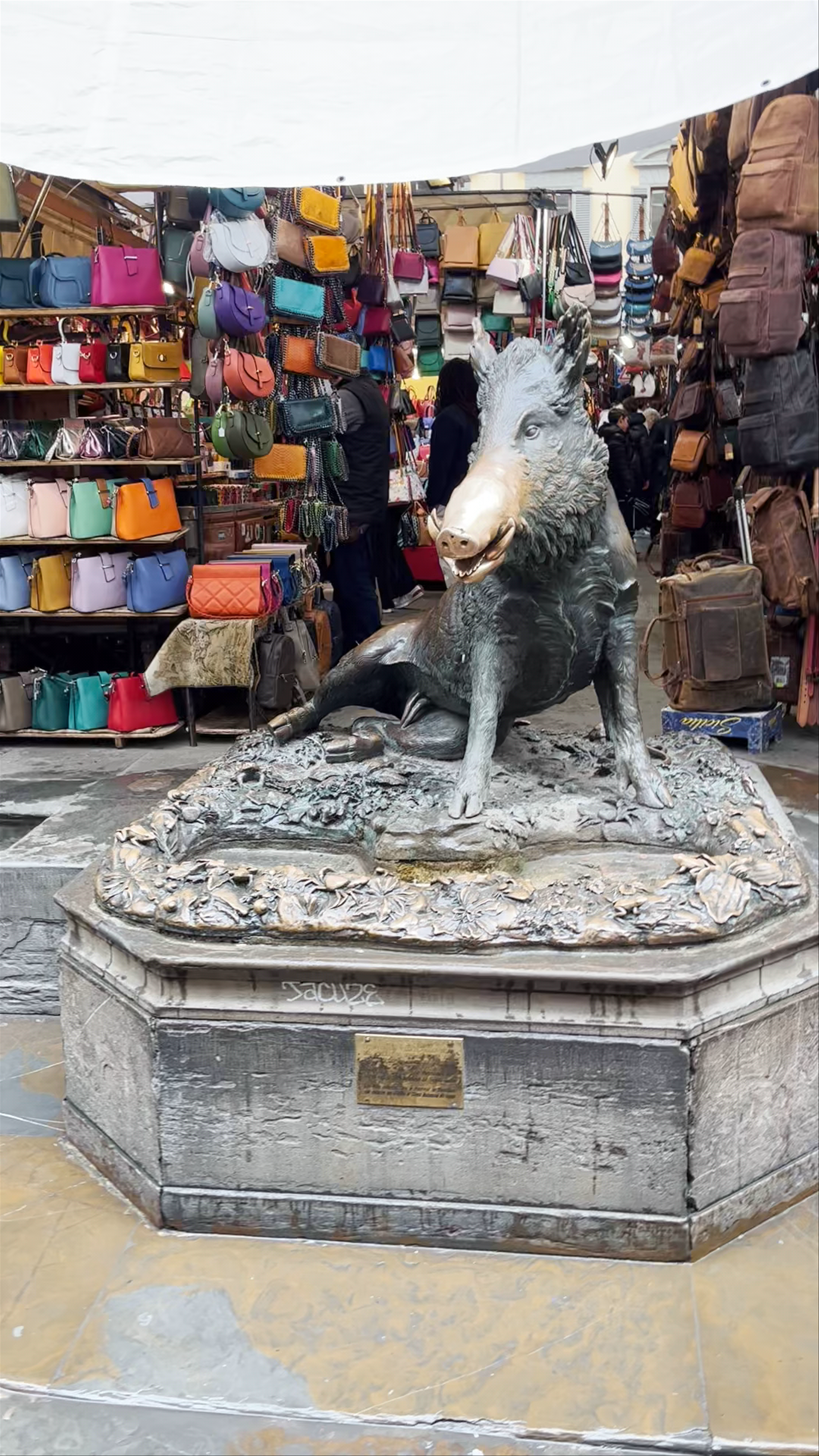 Porcellino: Iconic Boar Statue and Bustling Market in Florence