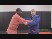 Russian Belt Grip (over the back – far side shoulder)