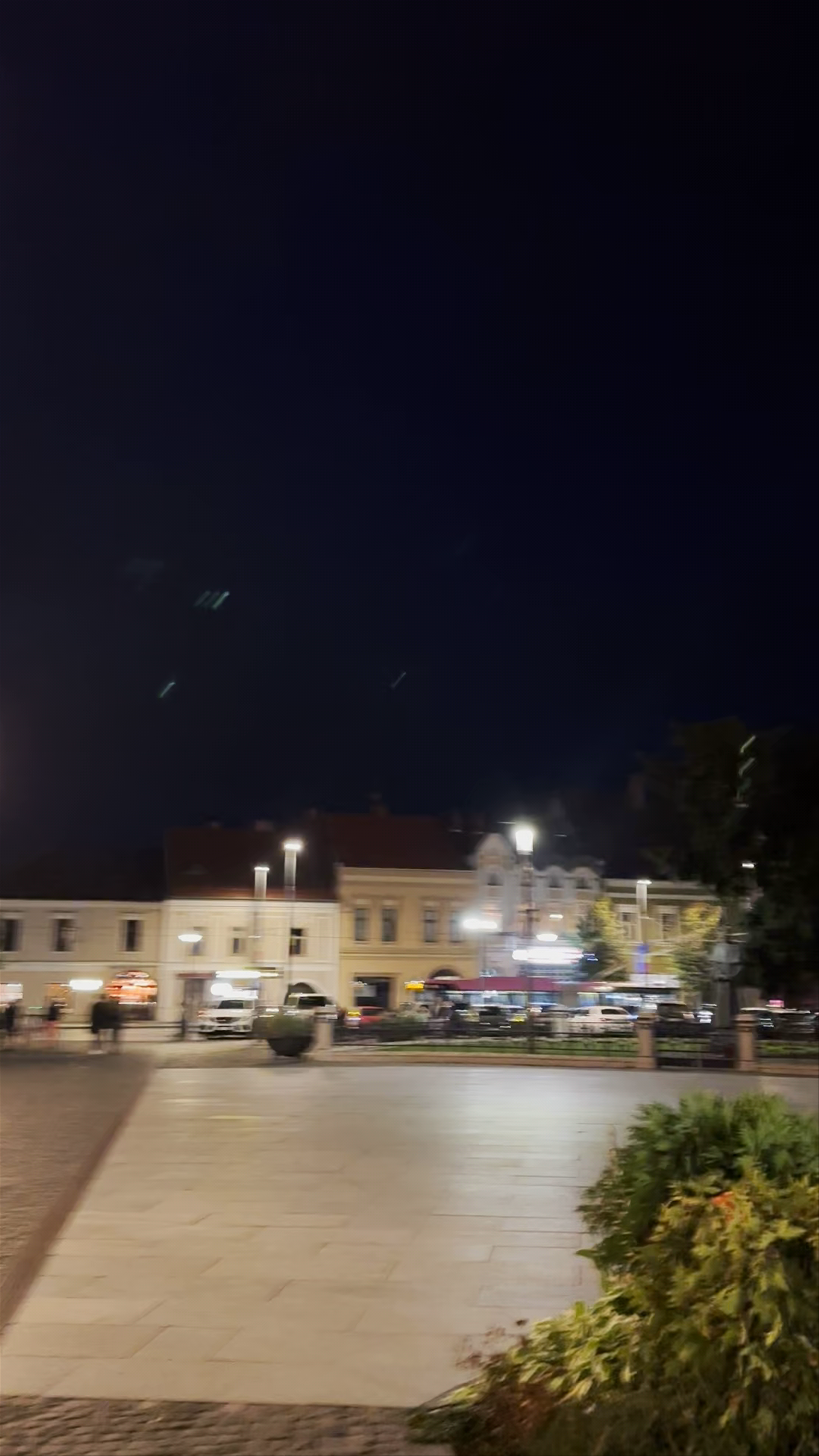 Evening Stroll through Unirii Square, Cluj-Napoca