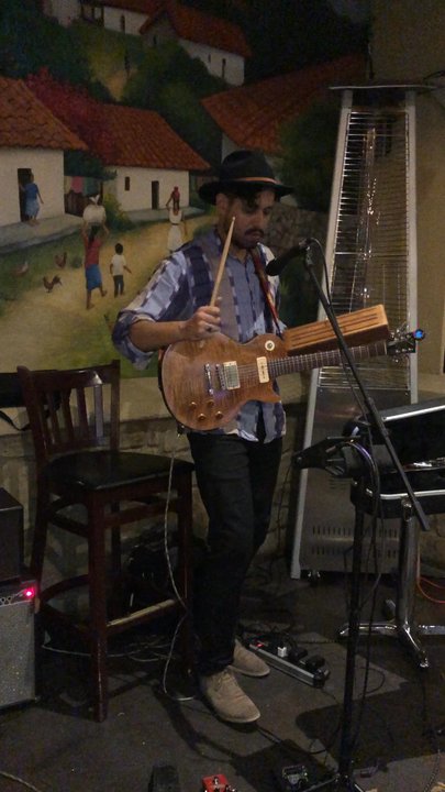 Casa Colombia - Frederico7 playing for dinner guests - Colombian Near Me - Austin, Texas
