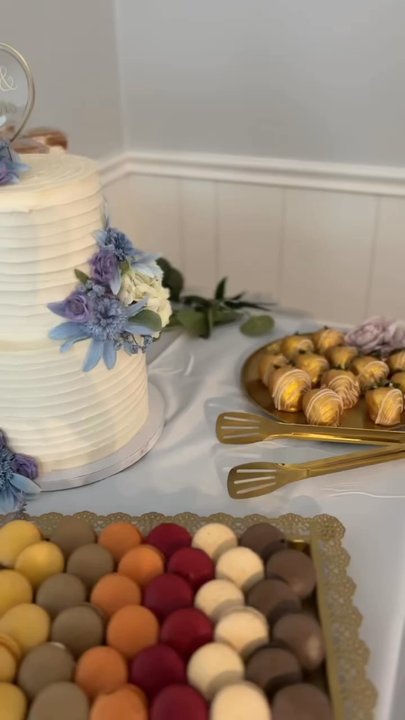 Dev's Cakes & Bakes - Everything you see here my wedding cake the shooters, macarons, chocolate covered strawberries was so amazing. - Desserts Near Me