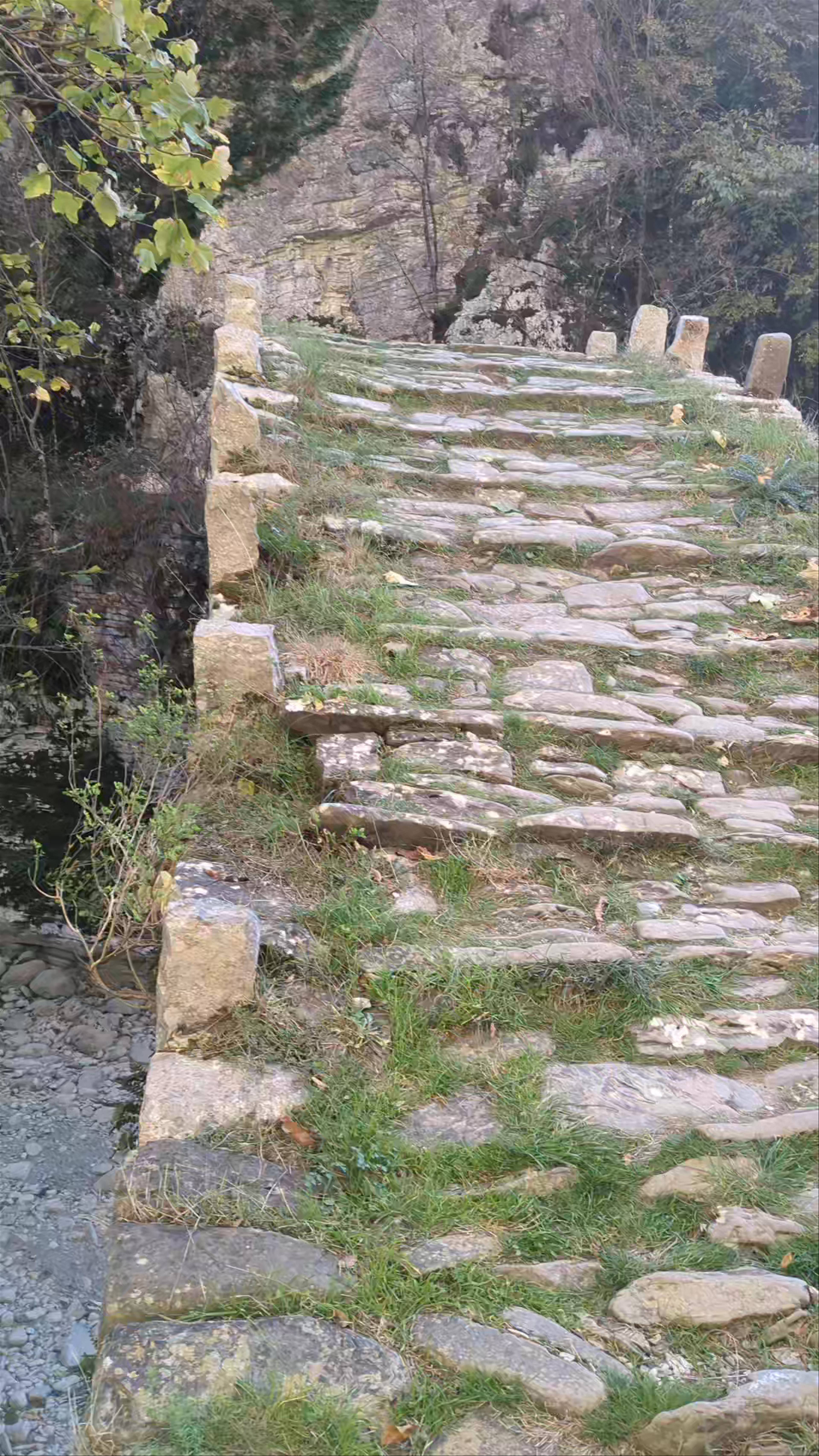 Lazaridi Bridge: Timeless Stone Pathway in Kipoi, Greece