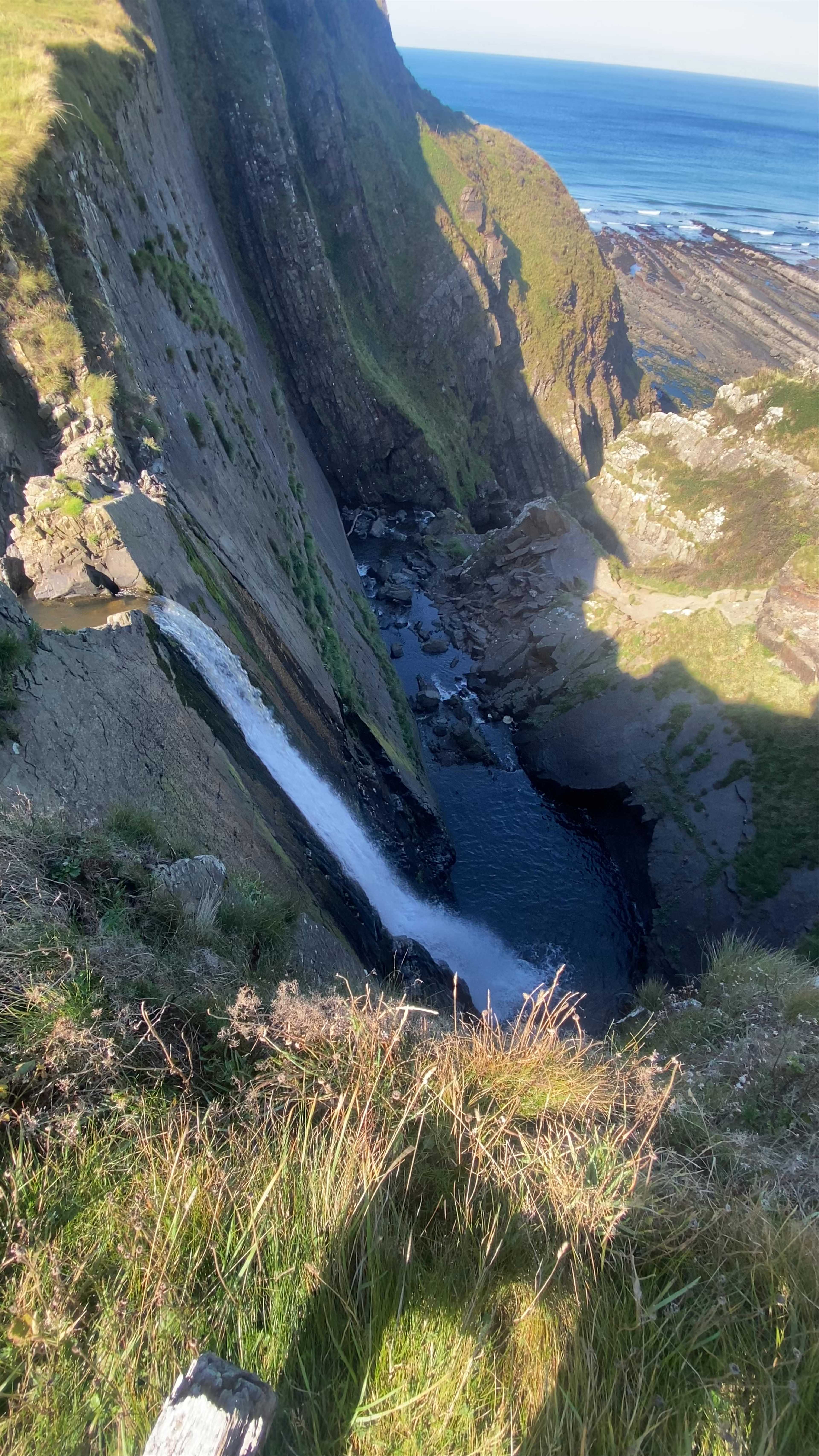 Speke's Mill Mouth Waterfall: Dramatic Coastal Falls in Hartland, UK