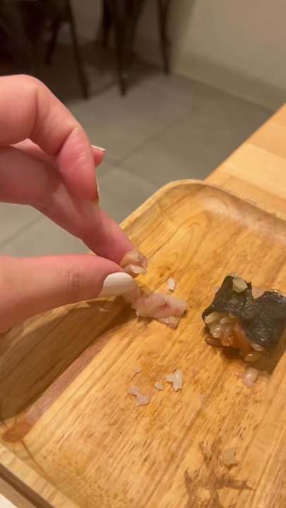 Akino - Fish bone in Yellowtail roll - Sushi Bars Near Me - Elmhurst, New York