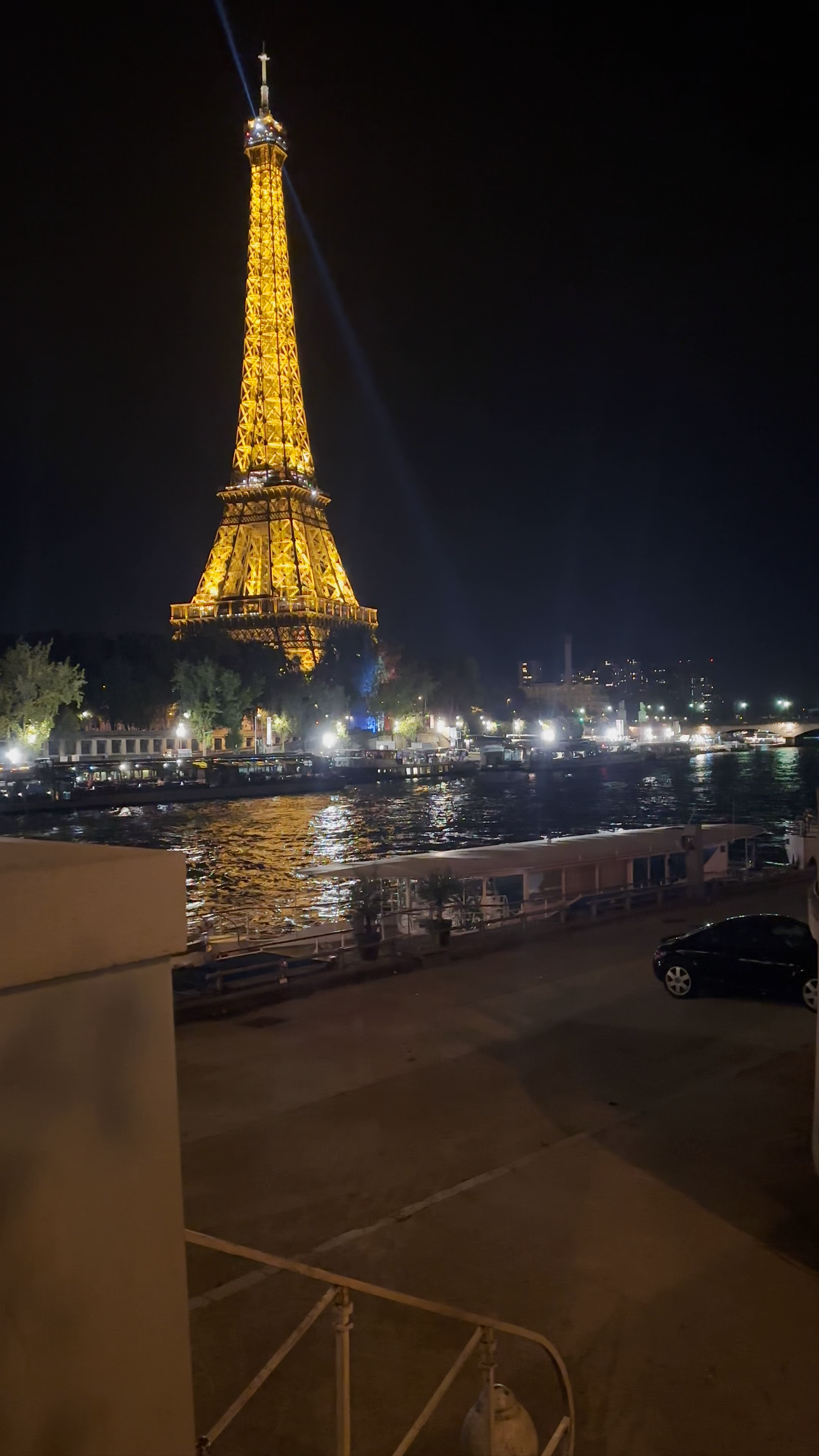 Pont de l'Alma by Night with Eiffel Tower Lights in Paris