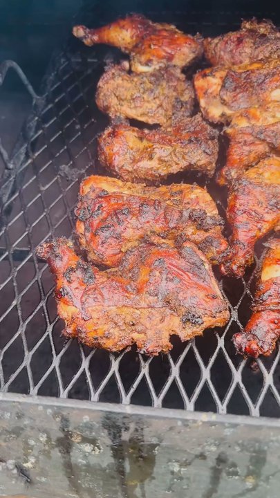 Jamaica's Hot Pot - Jerk chicken in the grill - Food Trucks Near Me - Baytown, Texas